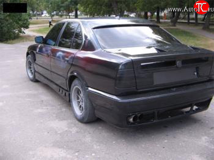 4 999 р. Накладка на задний бампер Rieger BMW 5 серия E34 седан дорестайлинг (1988-1994)  с доставкой в г. Белгород