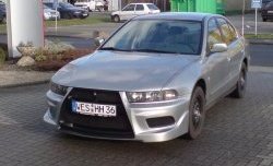 11 099 р. Передний бампер Evo style Mitsubishi Galant 8  дорестайлинг седан (1996-1998) (Без сетки, Неокрашенный)  с доставкой в г. Белгород. Увеличить фотографию 3