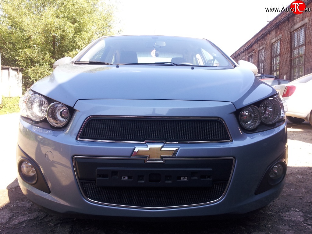 1 469 р. Нижняя сетка на бампер Russtal (черная) Chevrolet Aveo T300 седан (2011-2015)  с доставкой в г. Белгород