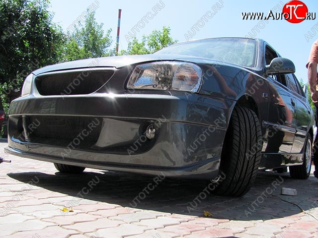 6 099 р. Передний бампер Racer Hyundai Accent 2 LC седан дорестайлинг (ТагАЗ) (1999-2012) (Неокрашенный)  с доставкой в г. Белгород