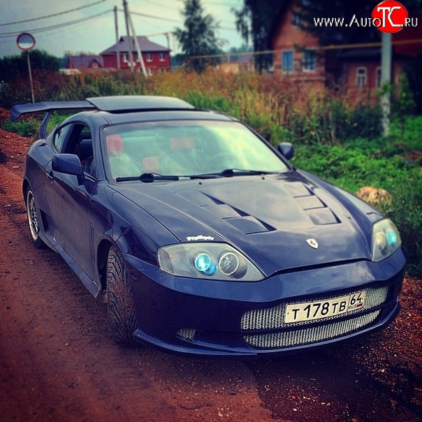 9 649 р. Передний бампер Aston Hyundai Coupe (2002-2008) (Неокрашенный)  с доставкой в г. Белгород