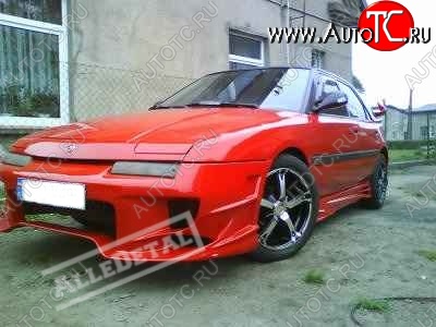 25 699 р. Передний бампер R1 Mazda 323 BW рестайлинг седан (1989-1993)  с доставкой в г. Белгород