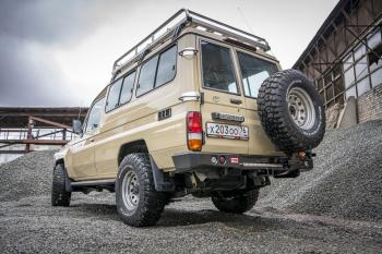 98 999 р. Бампер РИФ силовой задний Toyota Land Cruiser 78 2007+ с квадратом под фаркоп, калиткой и фонарями РИФ rif078-21125  с доставкой в г. Белгород. Увеличить фотографию 2